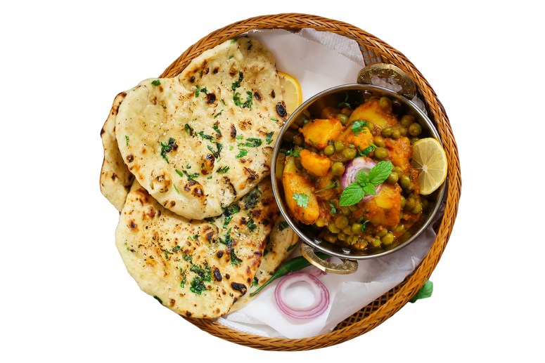 North indian food with naan bread and sabji, a lentil based curry.