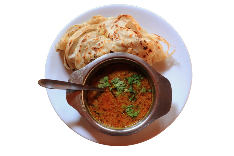 Two pieces of Hotel Daawat Parotta served with Hotel Daawat Mutton Curry